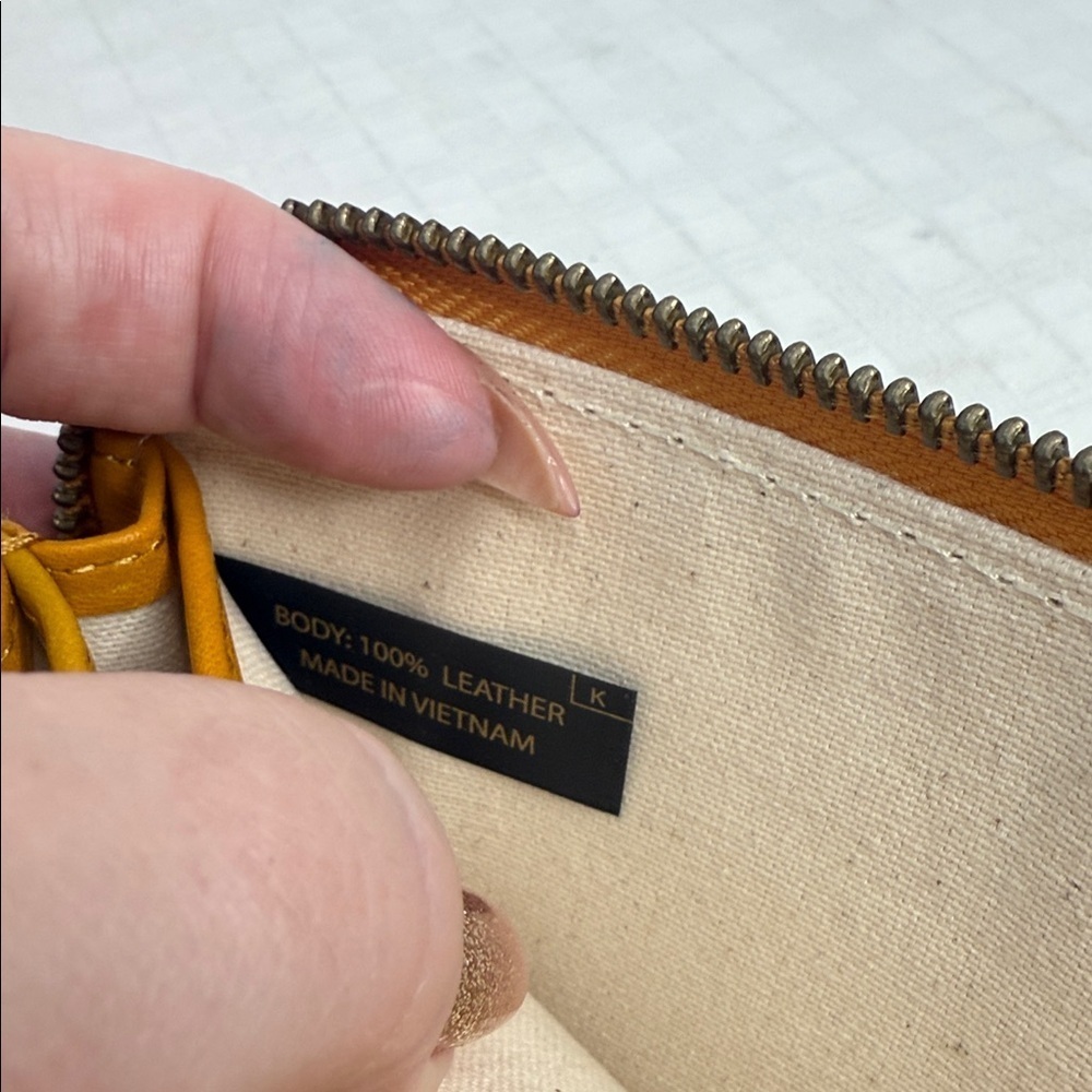 Margot Anna Zip Around Leather Wallet in marigold yellow. - Picture 9 of 9